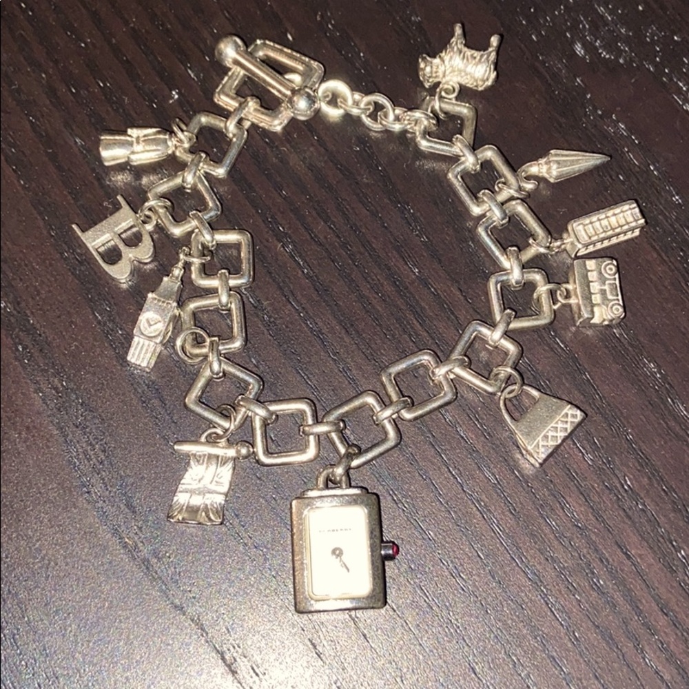 Burberry silver charm bracelet watch.